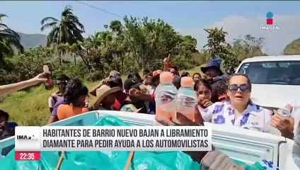 Habitantes de Barrio Nuevo piden ayuda a automovilistas  en autopistas