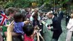 Prince William poses for selfies at Singapore airport