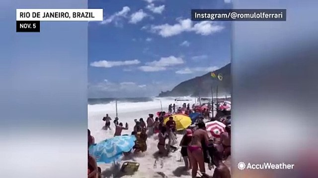 Huge wave catches beachgoers off-guard in Rio de Janeiro