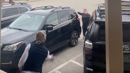 'Here, your keys!' - Woman tips forward and falls trying to catch her car keys