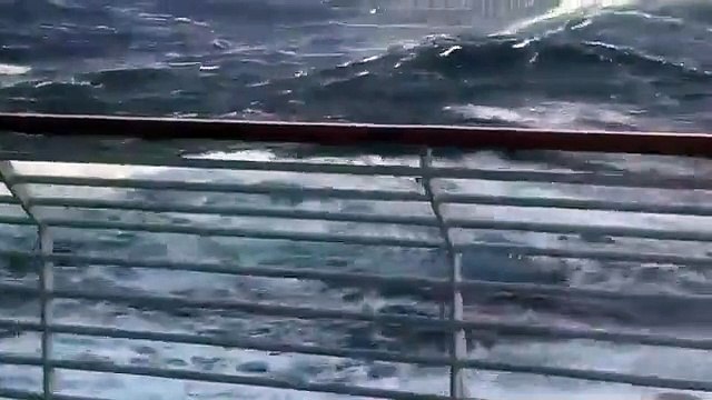 BBC reports tables were flying as waves threw people all up and down the place , say passengers on UK cruise ship 'Spirit of discovery' caught in storm.