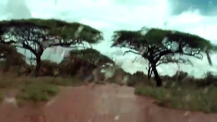 Land Rover offroad in water near Amboseli National Park