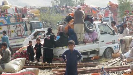 Deported Afghans cross Pakistan border confused and angry