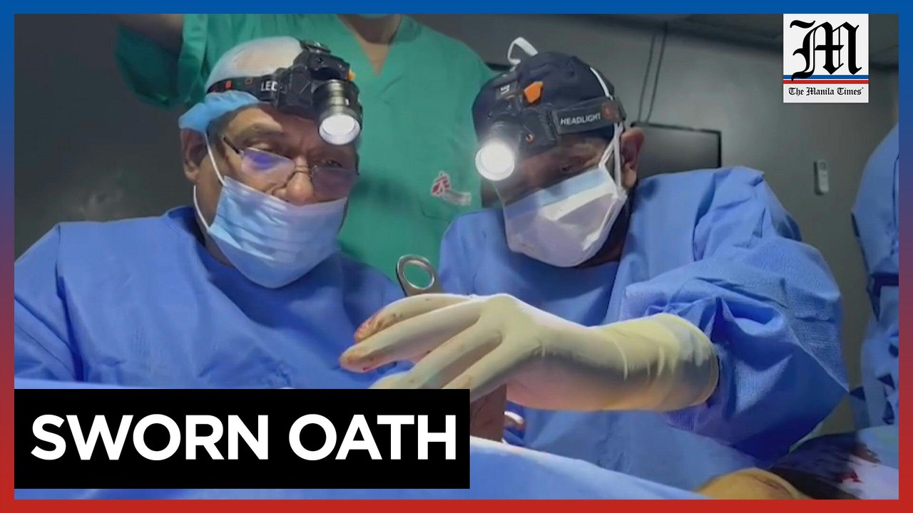 Gaza doctors battle power outages with head lamps, car batteries