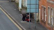 Watch: Thief robs elderly man on mobility scooter