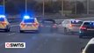 Dramatic footage shows police ramming a BMW on a motorway