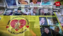 Familiares de desaparecidos colocan un muro con fotos de las víctimas en Michoacan