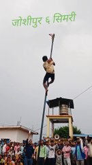 Amazing man climbed  pole