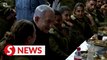 Israeli PM Netanyahu has dinner with troops, over 100,000 Gazans fled