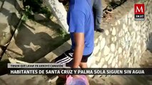 Habitantes de Acapulco acuden a arroyo para bañarse y lavar ropa; siguen sin energía y agua