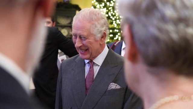 King marks 75th birthday a day early with three-tiered cake at Highgrove