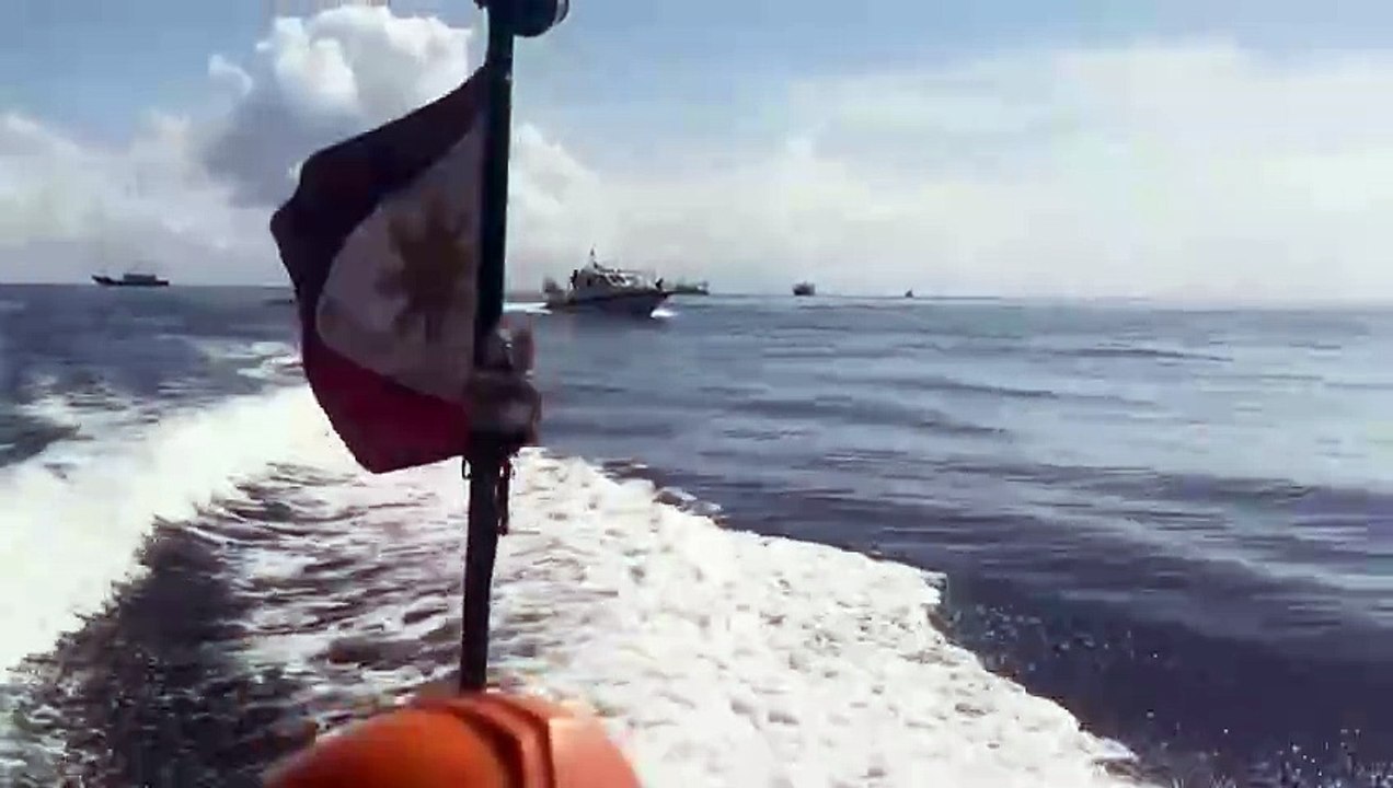 Chinese_boats_in_high-seas_chase_Philippine_boat_with_media___AFP(720p)