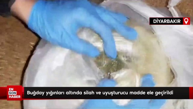 Diyarbakır'da buğday yığınları altında silah ve uyuşturucu madde ele geçirildi