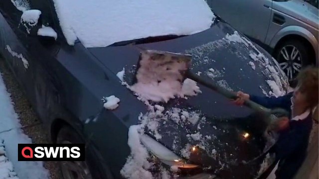 Schoolboy leaves dad's new car covered in scratches after clearing snow off bonnet with a SHOVEL