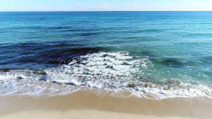 Waves hitting the beach