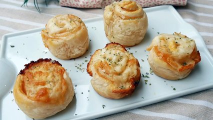 Espirales de hojaldre rellenas de jamón y queso