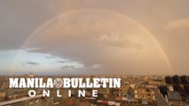 Rainbow appears in sky above Rafah at sunrise