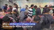 Palestinians pull children from rubble after strike on refugee camp