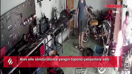 Alev elle söndürülünce yangın tüpünü çalışanlara sıktı