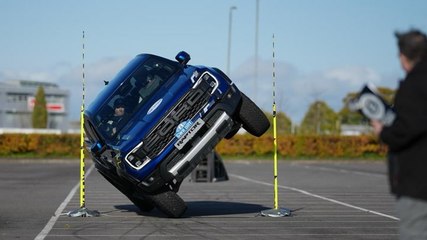 British stuntman breaks world record for driving truck on two wheels through tiny gap