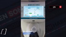 Şanghay'daki umumi tuvaletlerde bir idrar sağlık testi