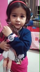 Cute Trishu have watch in wrist and doll in hand-dm