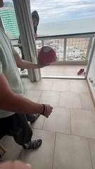 Soccer Ball Bounces Off Railing and Flies Back Into Room