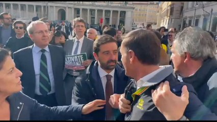 Lo scontro tra Prandini e Magi-Della Vedova davanti Palazzo Chigi