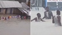 Kenyans wade through chest-high water as flash flooding wreaks havoc