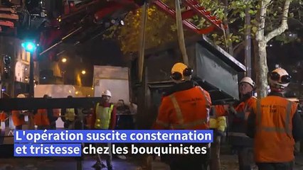 JO-2024: des bouquinistes consternés assistent à l'enlèvement de leurs "boîtes"