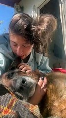 Woman Loves on Her Dying Dog