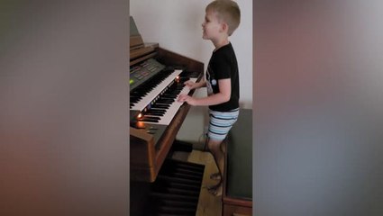 Eight-year-old who lost sight to cancer teaches himself piano