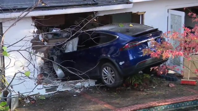 Firefighters on scene after Tesla crashes into family’s kitchen in California