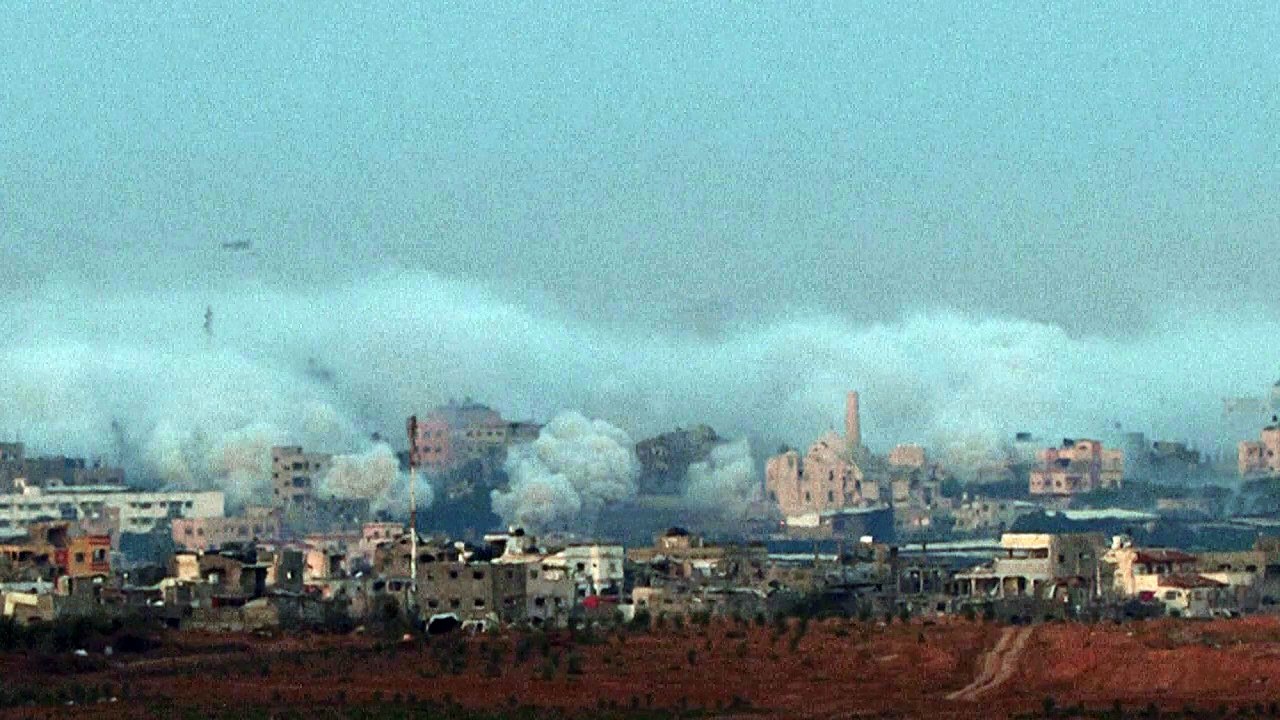 Smoke billows over northern Gaza as seen from Israel ahead of truce
