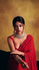 Stunning Desi Actress Dazzles in a Sexy Red Saree 🔥