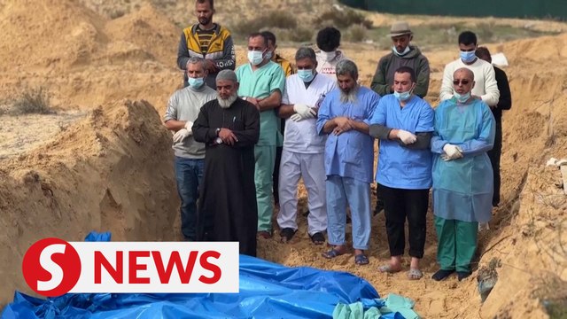 Unidentified Palestinians buried in mass grave in Gaza