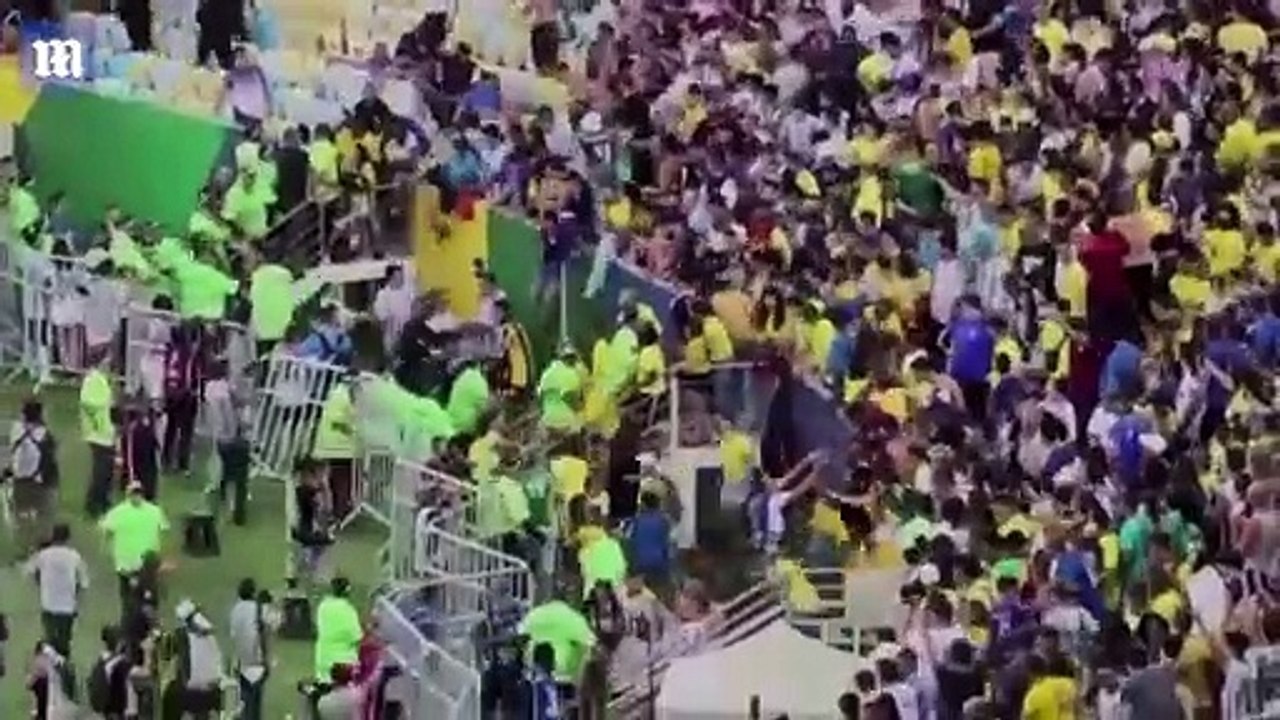 Horrifying moment police clash with Argentina football fans in qualifier against