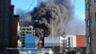 Black smoke engulfs tower block in Reading as worker rescued from neighbouring roof