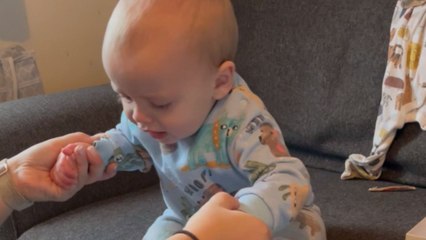 11 Months Old baby tries on shoes for the first time *Hilariously Cute Reaction*