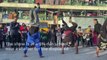 Acrobats entertain children at a school for displaced children in Rafah