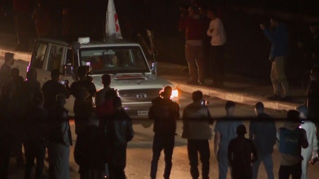 Red Cross trucks seen arriving at Rafah crossing from Gaza into Egypt