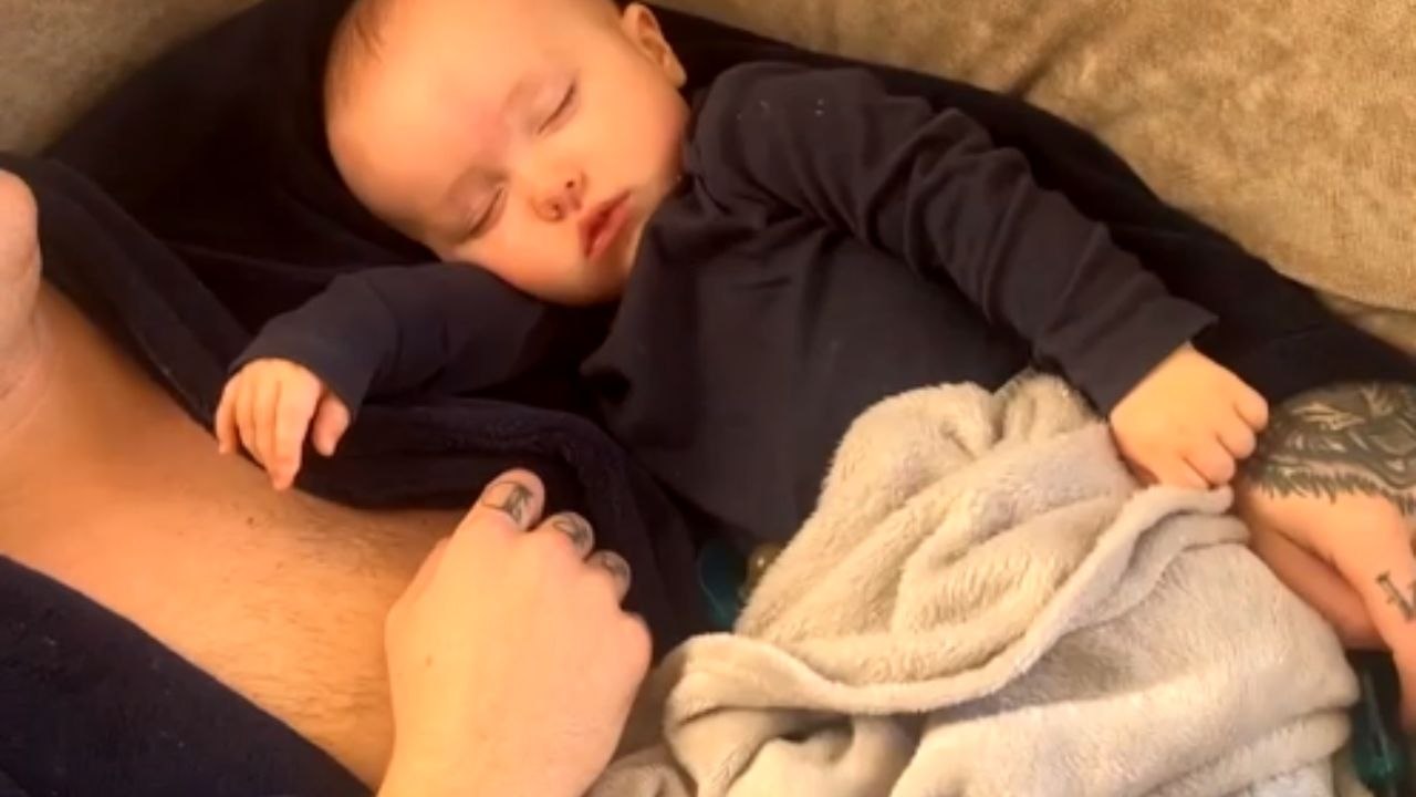 Woman pranks sleeping partner by putting their baby's bottle in his mouth