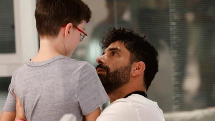 Nine-year-old hostage hugs father for first time after release from Gaza