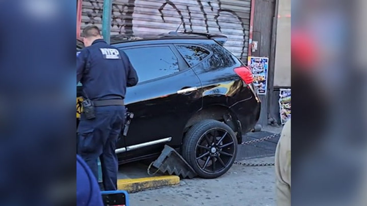 Car wedged in Manhattan subway station after man drives into entrance