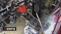 Customer at a barbershop had a close shave when a truck smashed through the window