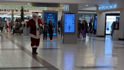 This magical moment between excited kid and Santa Claus will melt your heart
