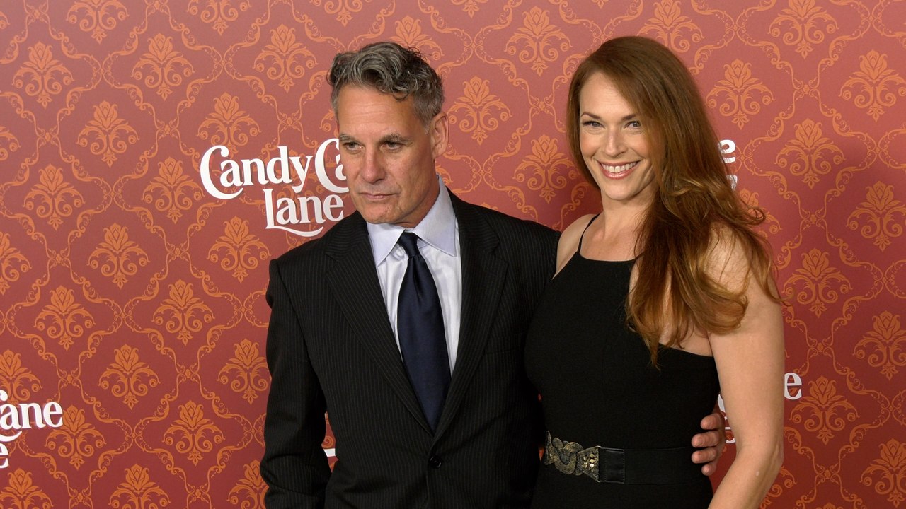 Adrian Pasdar and Amanda Righetti "Candy Cane Lane" World Premiere Red Carpet Arrivals