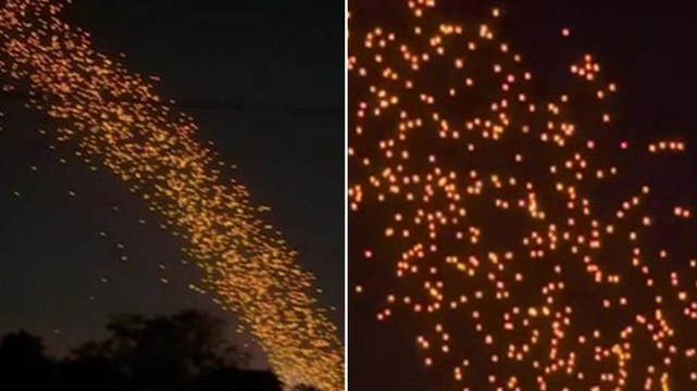 Floating lanterns form mesmerising stream of lights during Thai festival