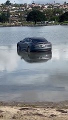 King Tide Turns Car To Island