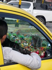 Taxi Driver Creates Complex Nativity Scene on Dashboard